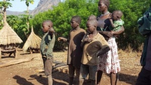 Ugandan woman and some children